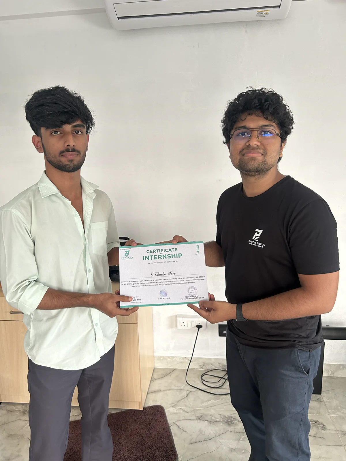 A certificate handover from the 2026 internship cohort